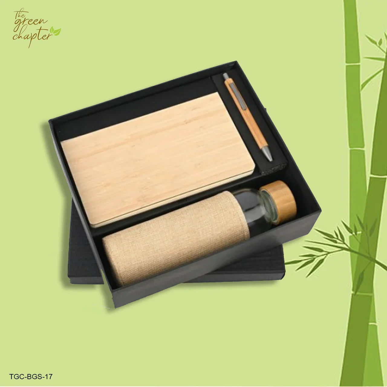 Premium bamboo gift set featuring insulated flask, diary, and pen on a wooden background